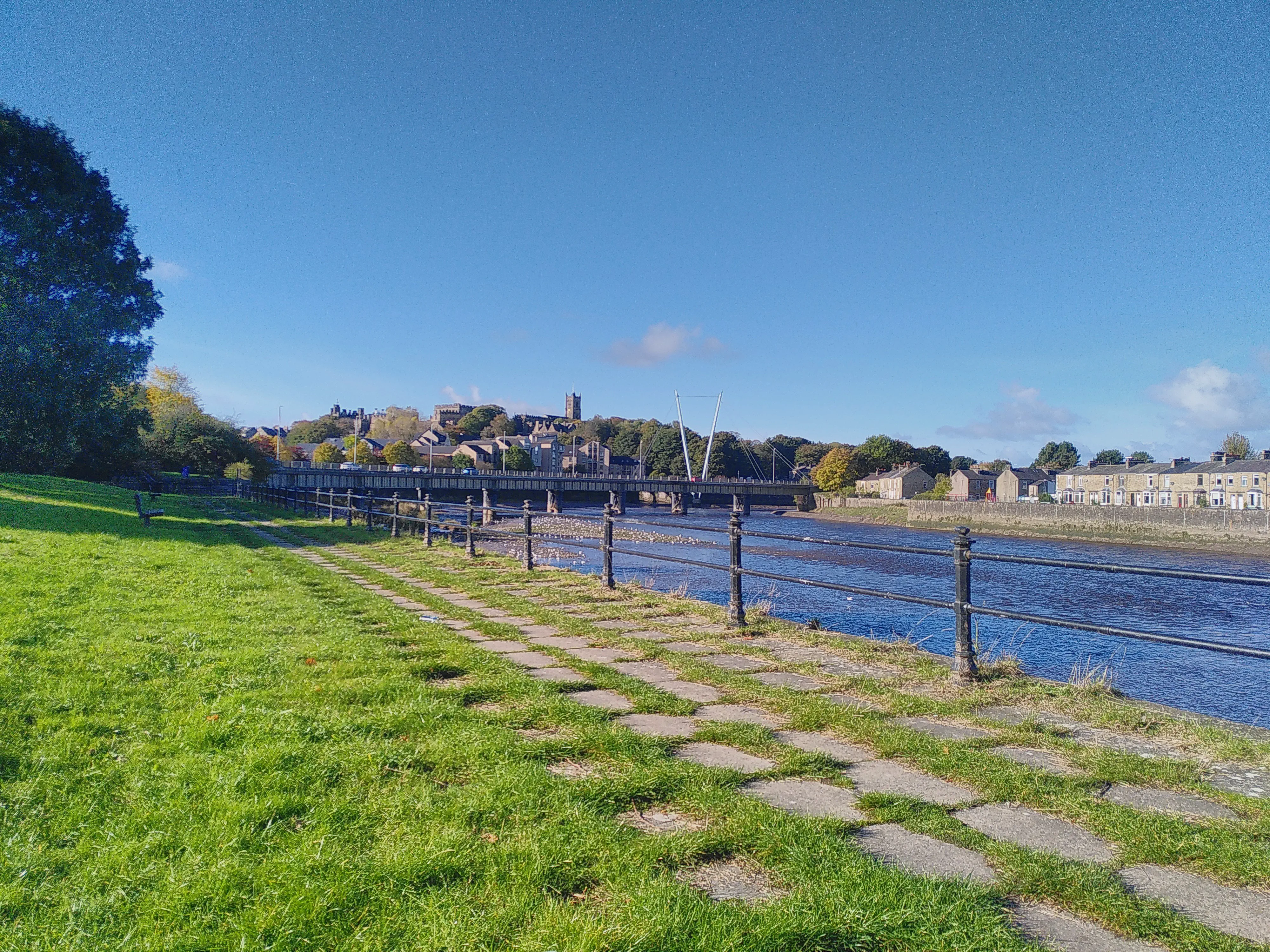 The River Lune, crossed by a bridge and viewed from its bank