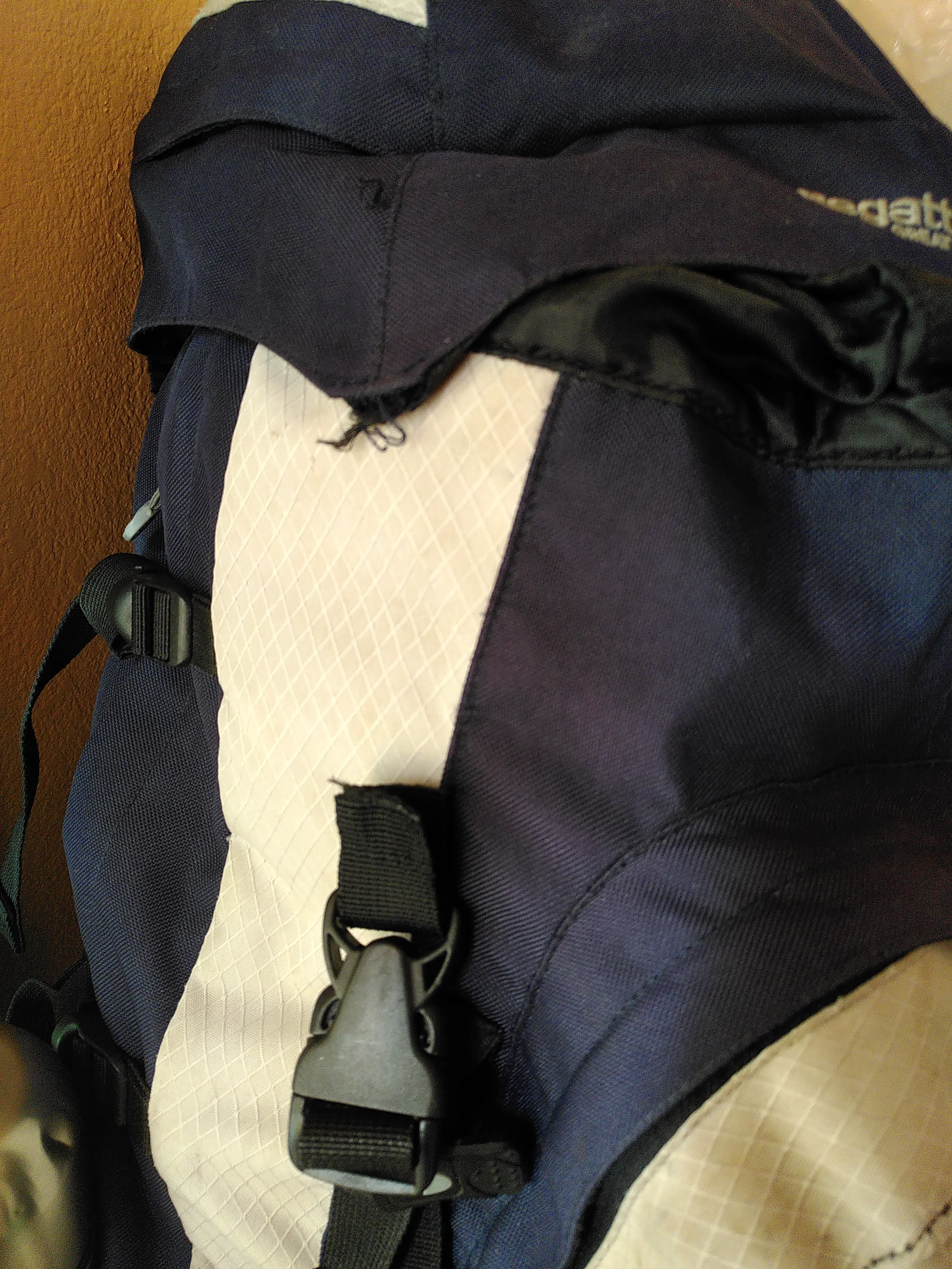 A rucksack with a torn strap