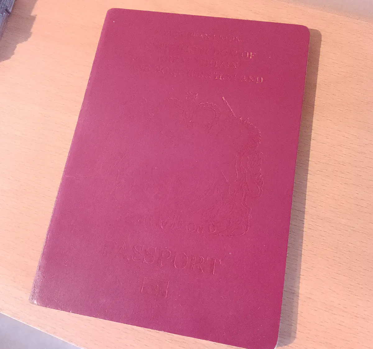 Cover of a worn British passport