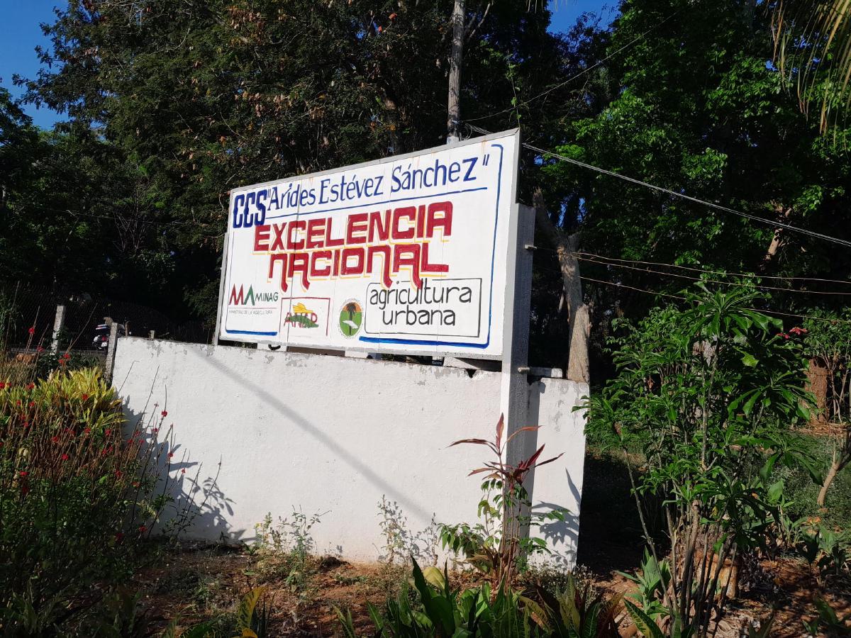 A sign reading ‘CCS “Arides Estévez Sánchez”’
