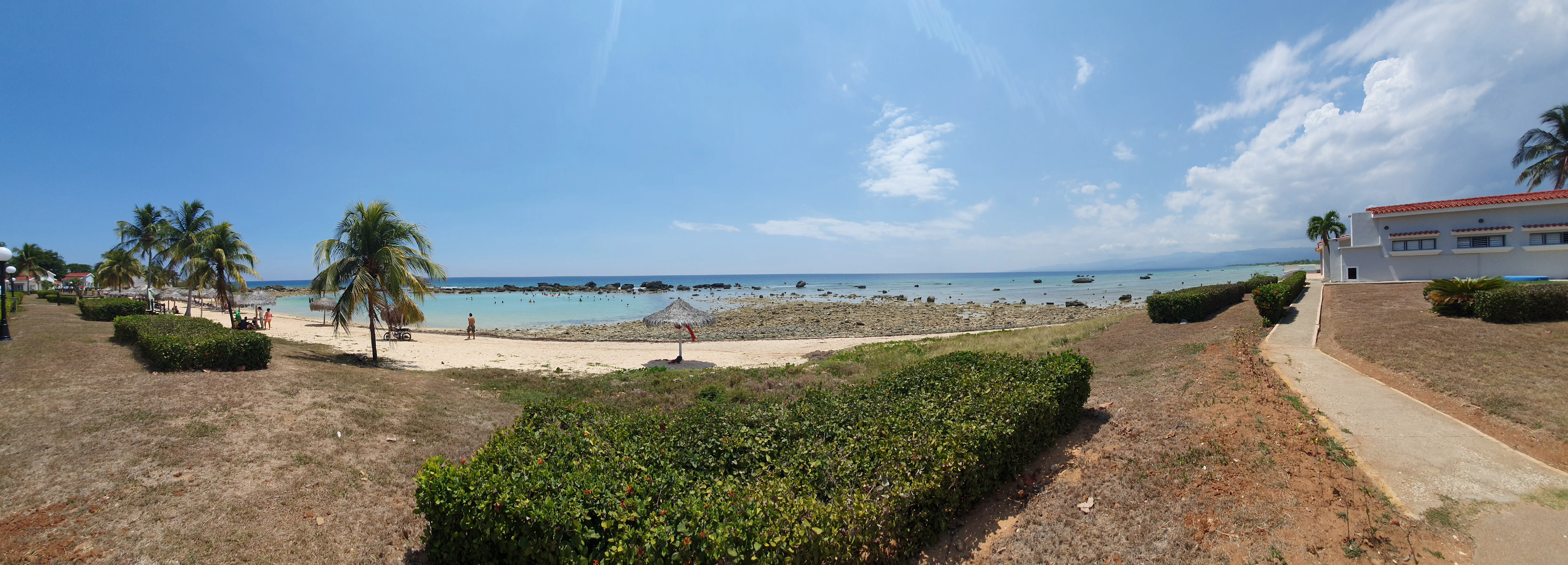 Panorama of a beautiful white-sand Caribbean beach