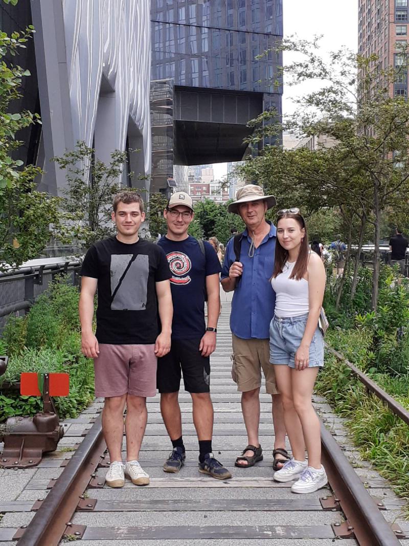 Family standing in a park