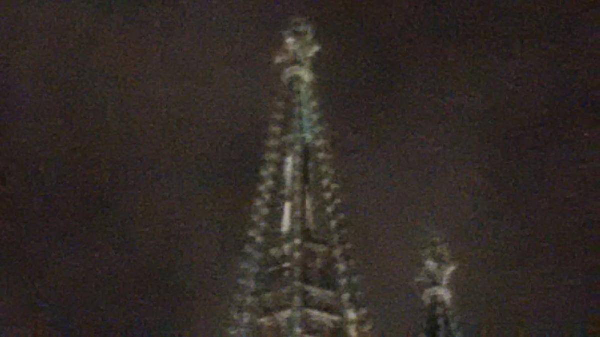 Detail of the Cologne Cathedral spire, highlighting an external ladder at the top