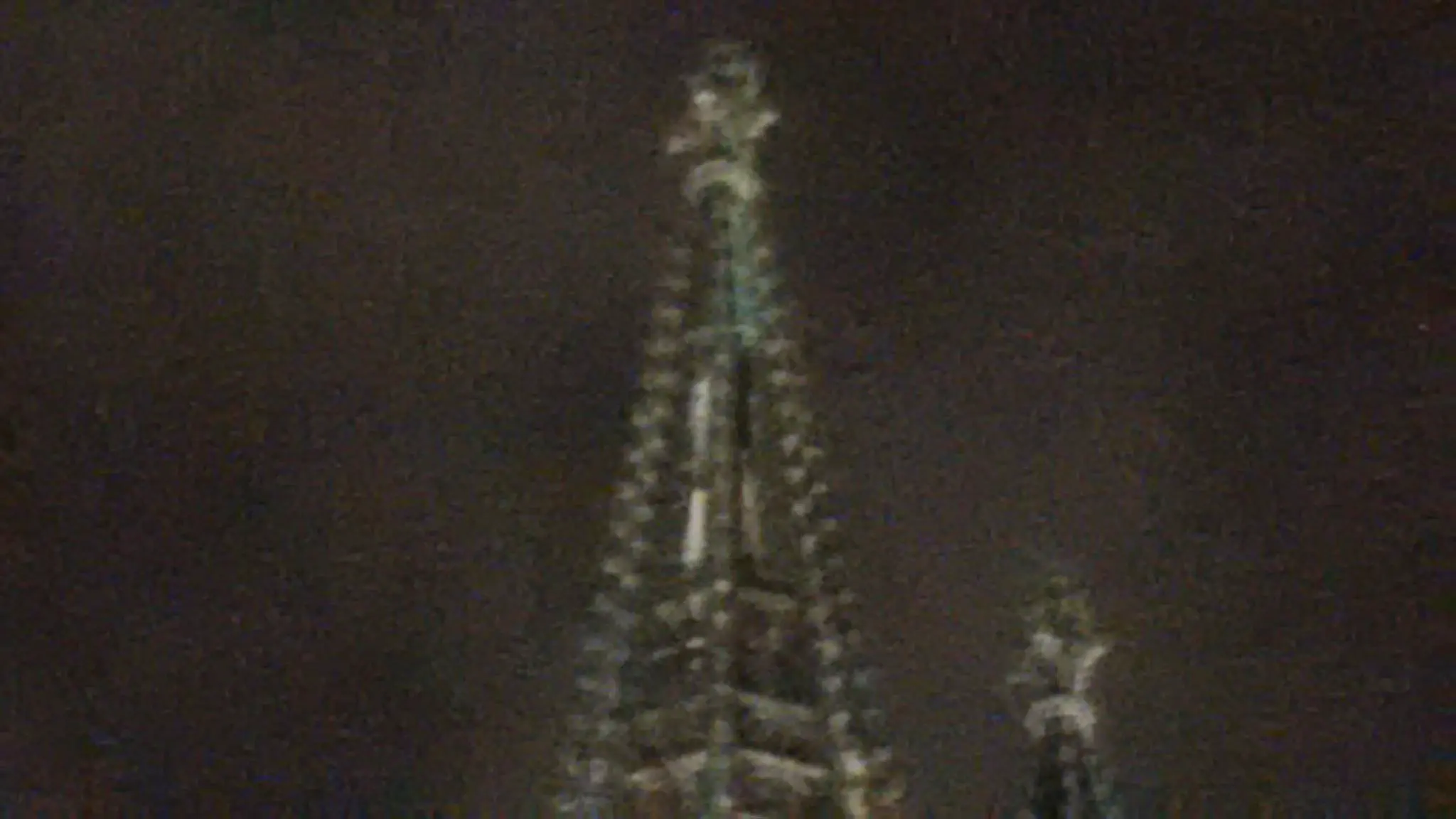 Detail of the Cologne Cathedral spire, highlighting an external ladder at the top