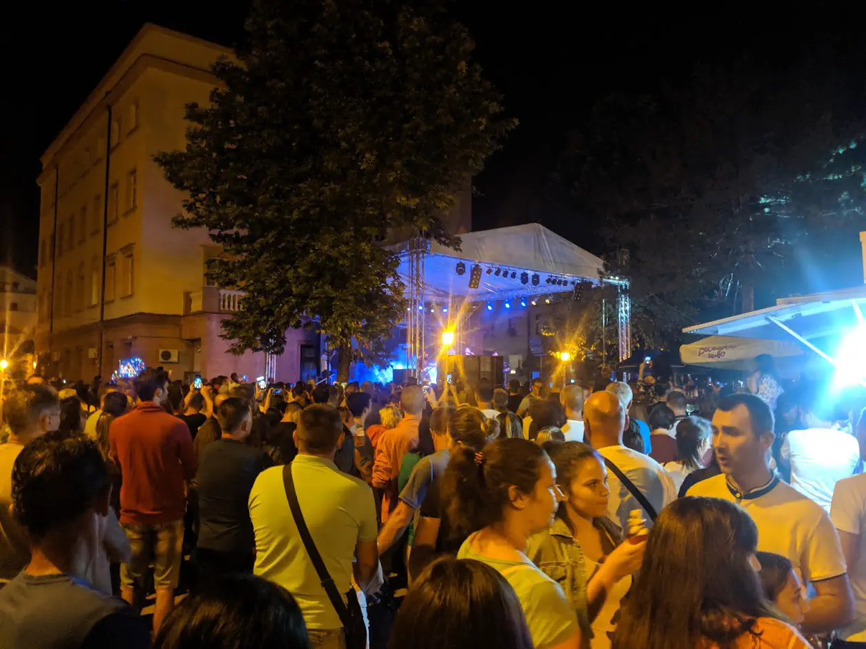 A busy street party scene