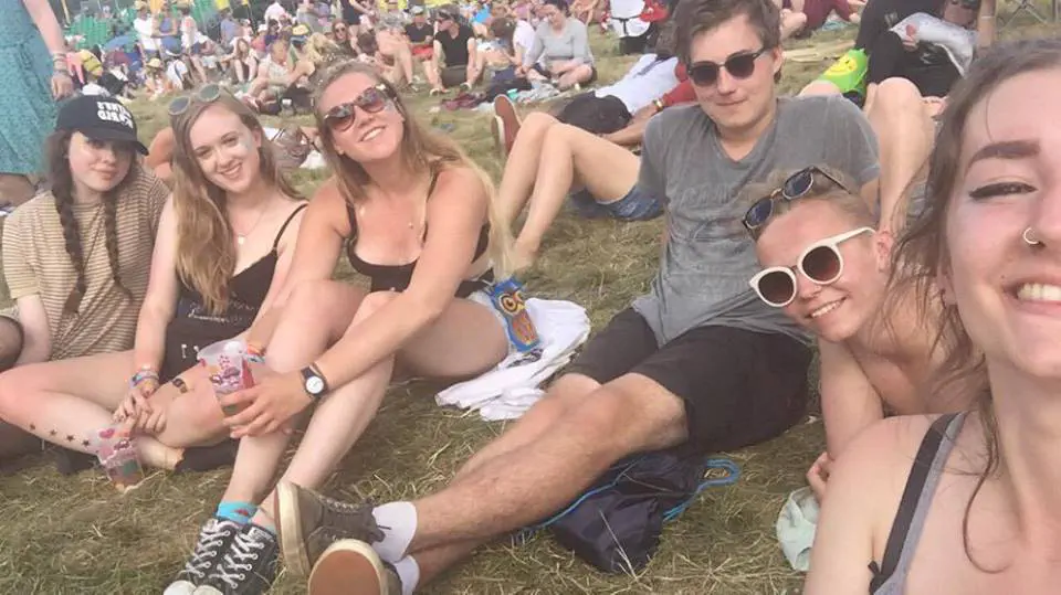 Me and friends sitting on the grass