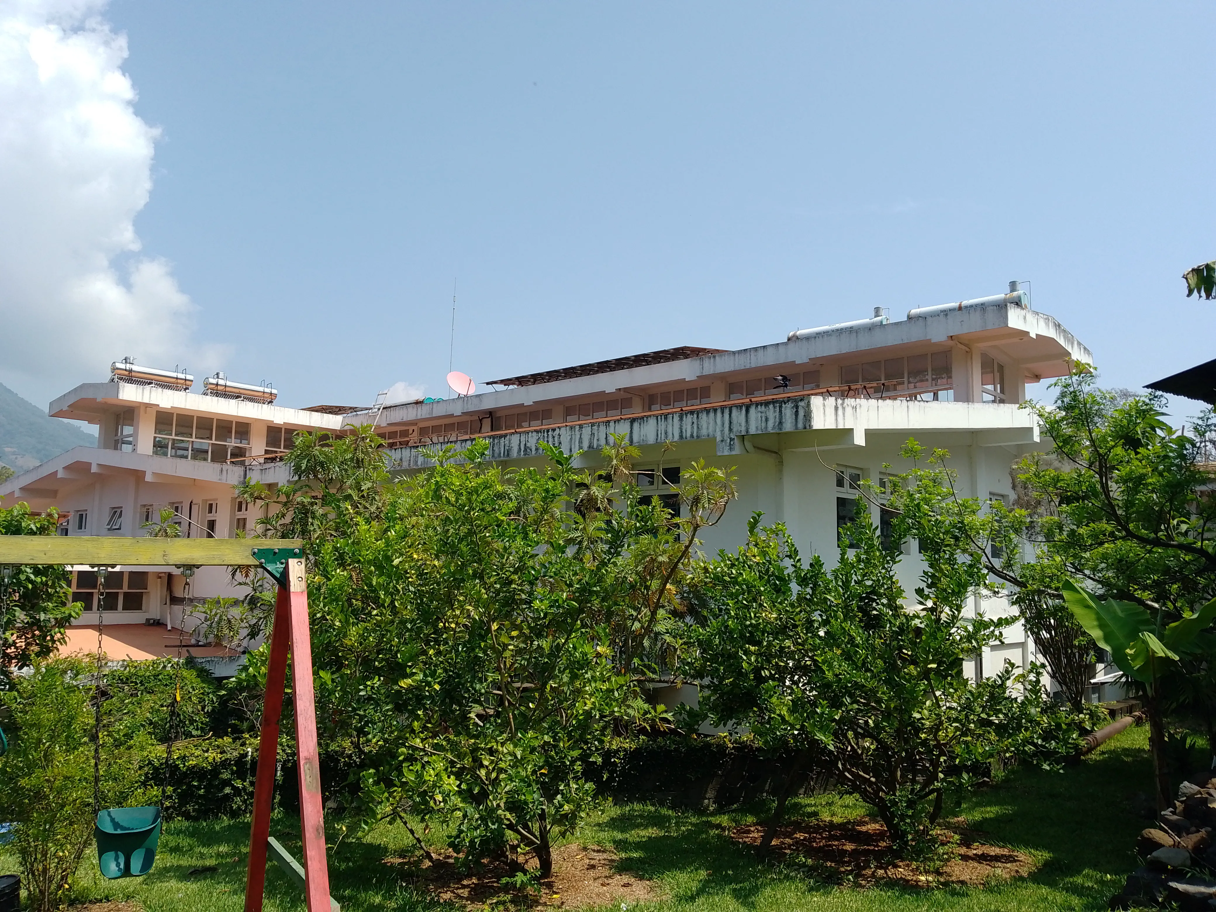 The roof of a building covered in solar panels