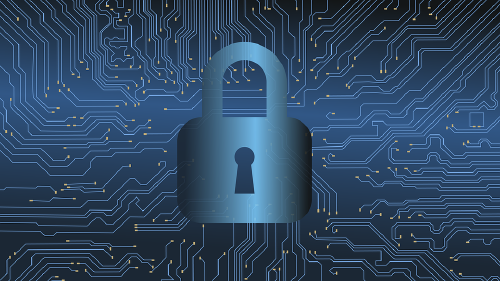 A padlock in front of circuit board imagery