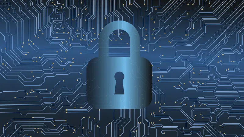 A padlock in front of circuit board imagery