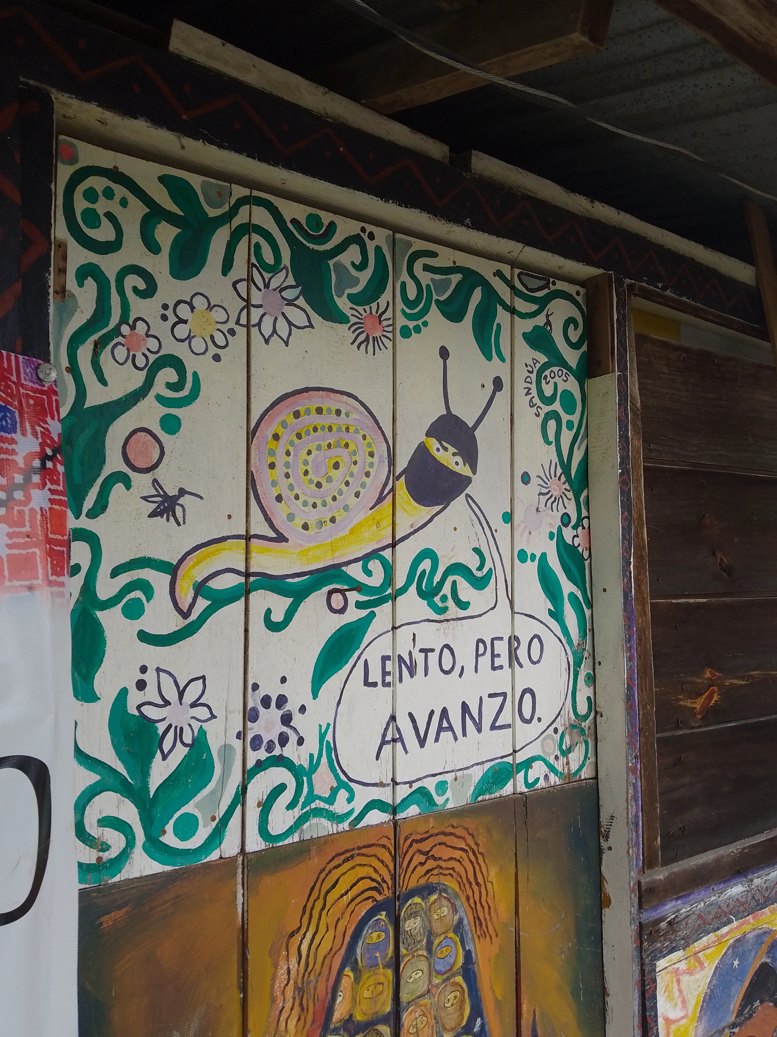 Mural of snail wearing a ski mask