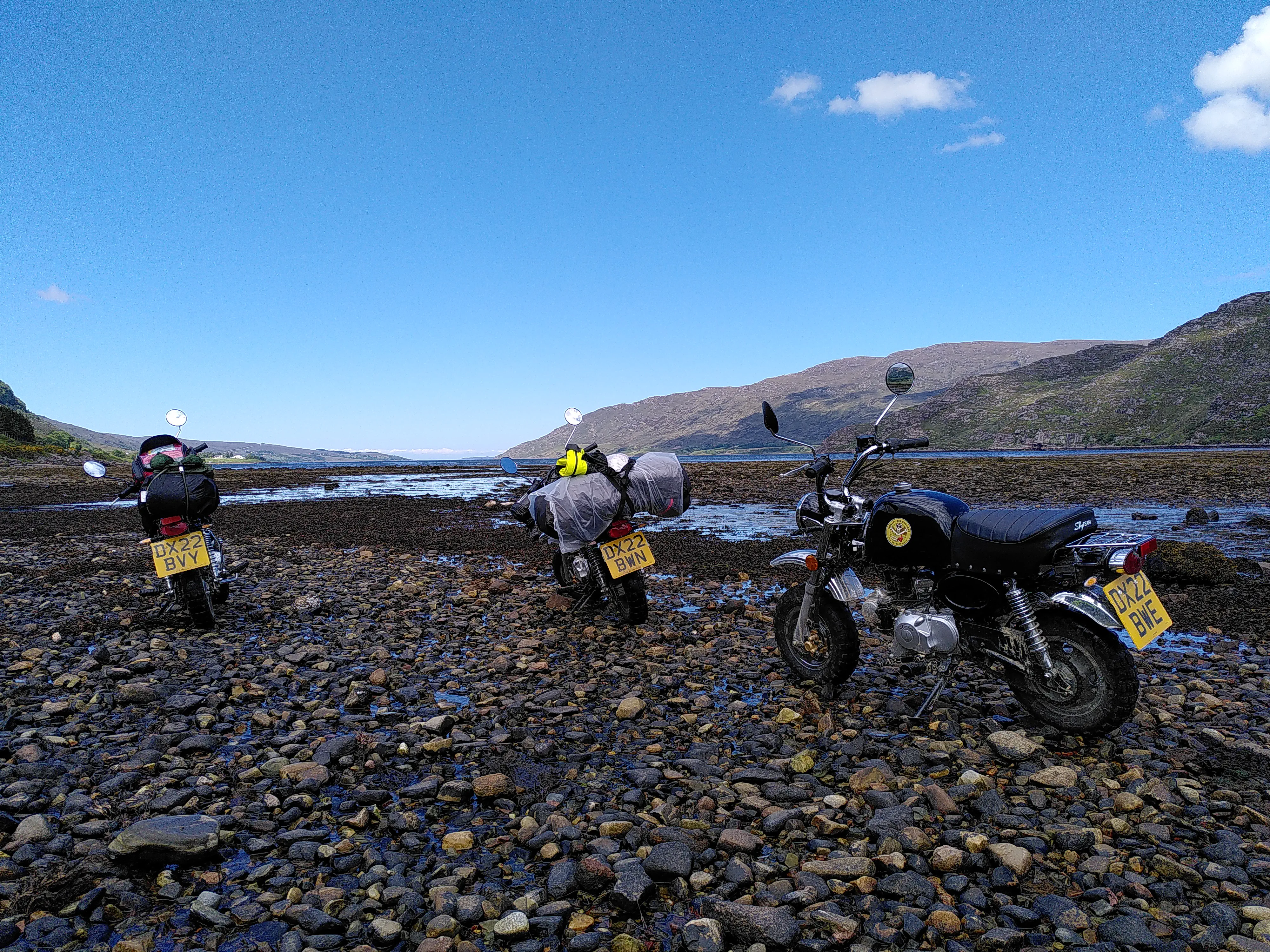 Our monkey bikes on a sandy beach