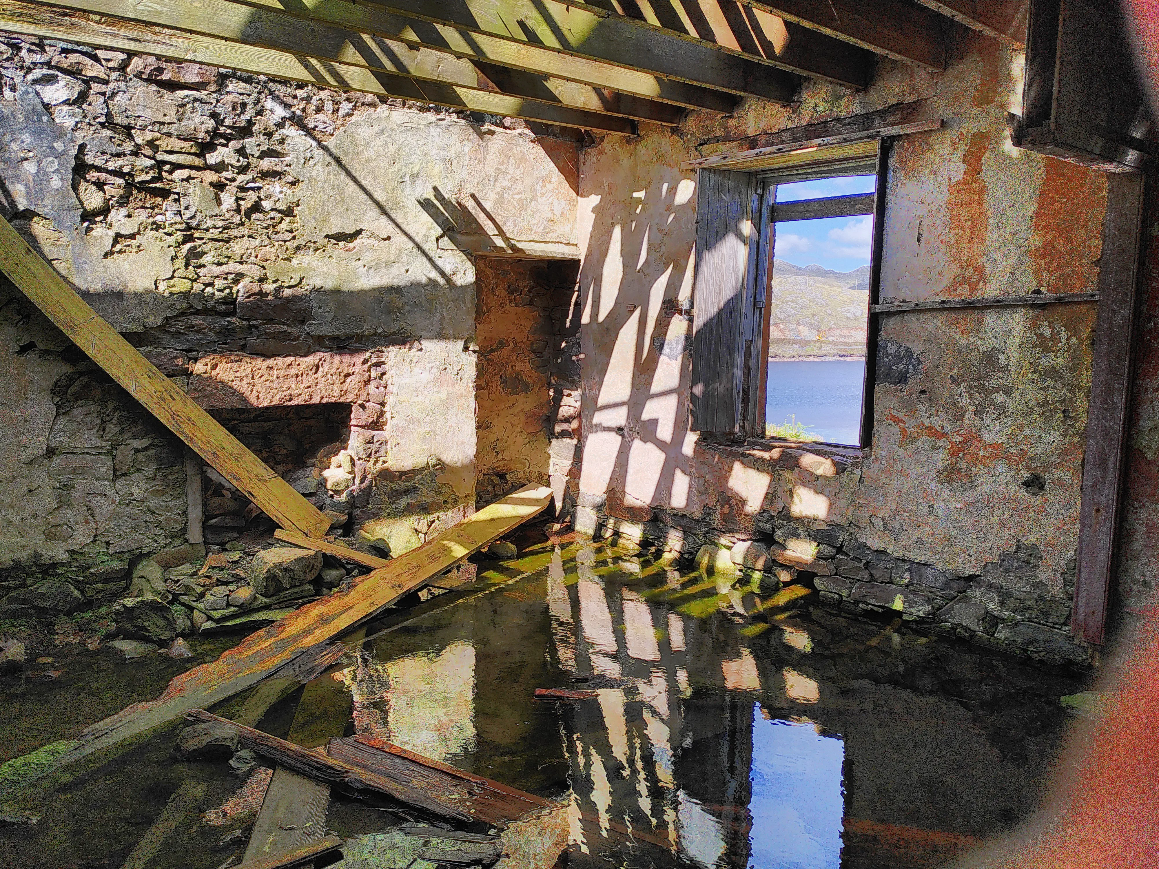 A decrepit, flooded house