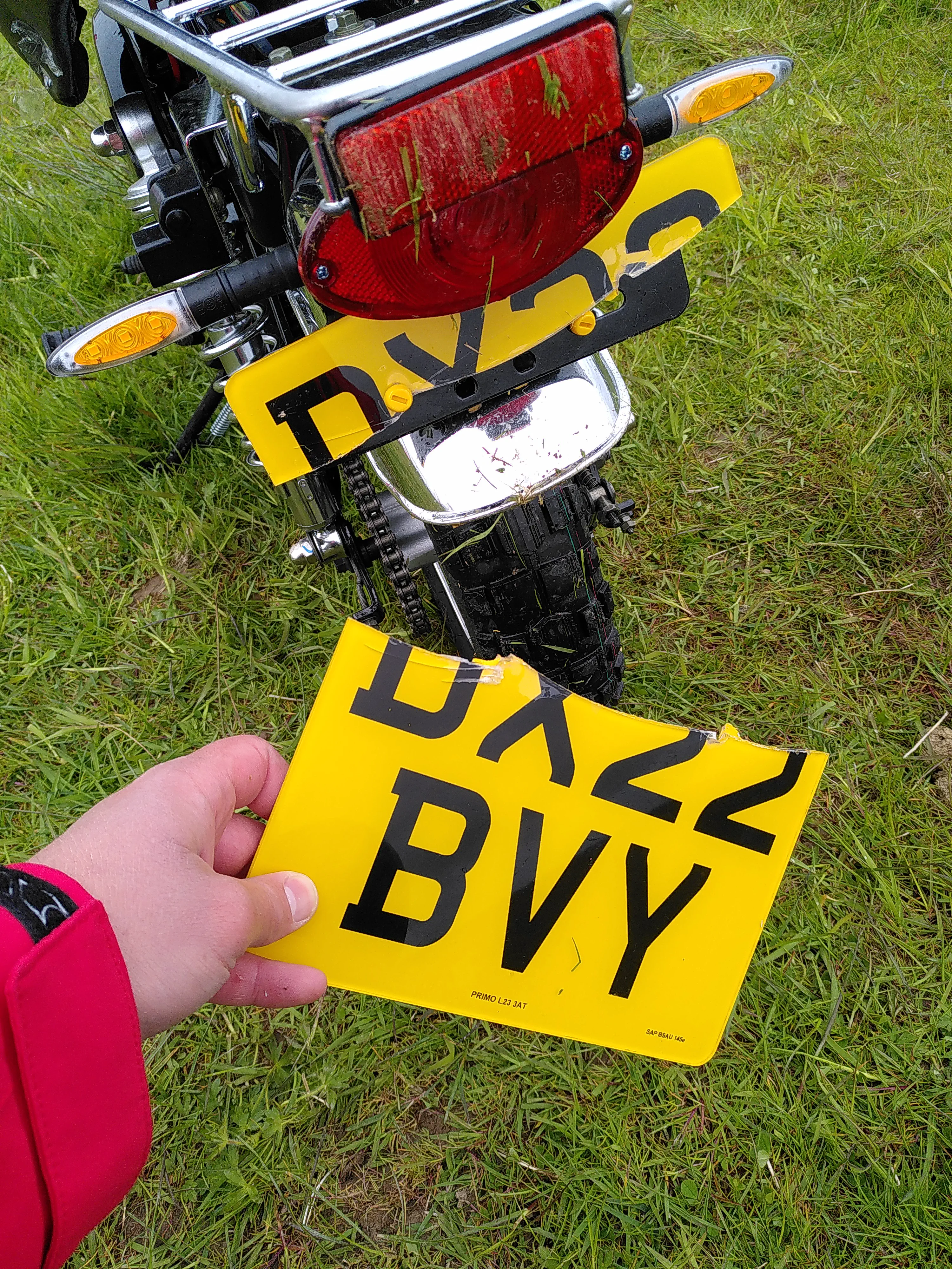 My monkey bike with the rear licence plate snapped in half