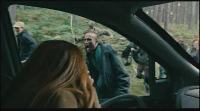 People attacking a car