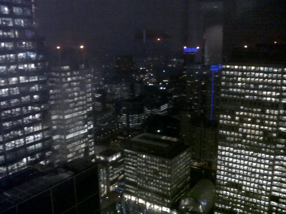 Canary Warf at night, viewed from a high skyscaper window