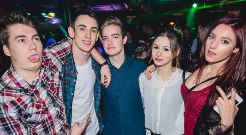 A group of people in a nightclub