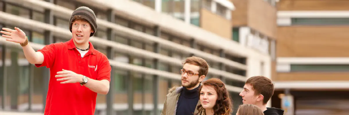 Tour guides leading a university tour
