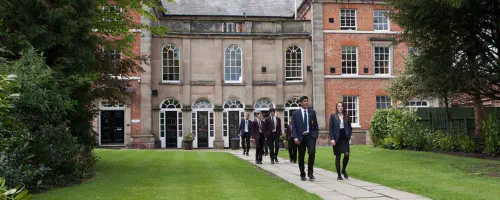 Students walking out of a school building