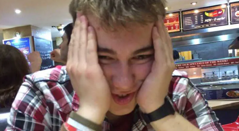 The author pulling a face in a takeaway